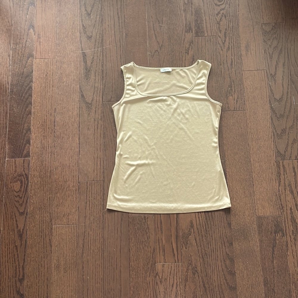 Laura gold tank top in perfect condition.